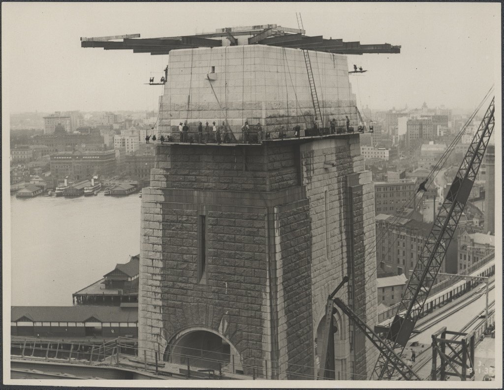 Southern pylon of the Harbour Bridge being washed, 1932, Sydney Harbour