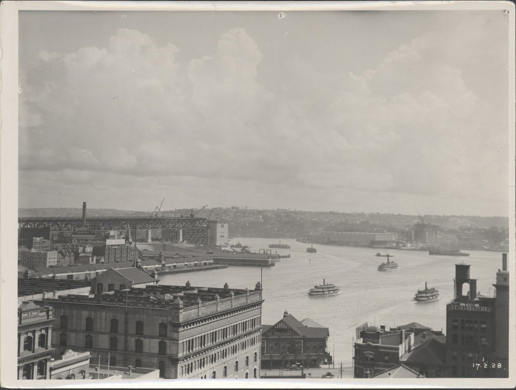 View from Circular Quay during the construction of Sydney Harbour Bridge, 1928