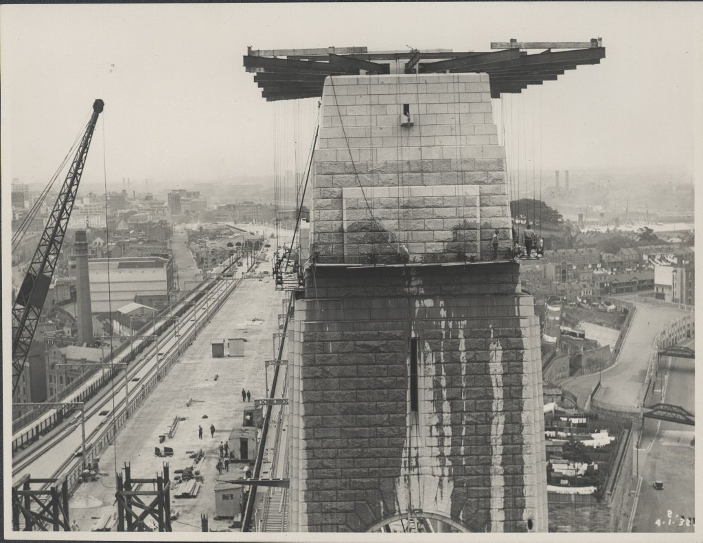 Southern pylon of the Harbour Bridge being washed, 1932, Sydney Harbour