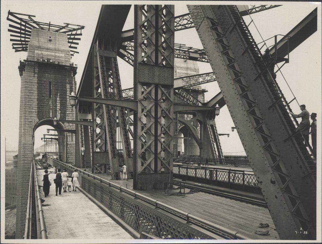 Two women and a child on the walkway of the Sydney Harbour Bridge, 1932