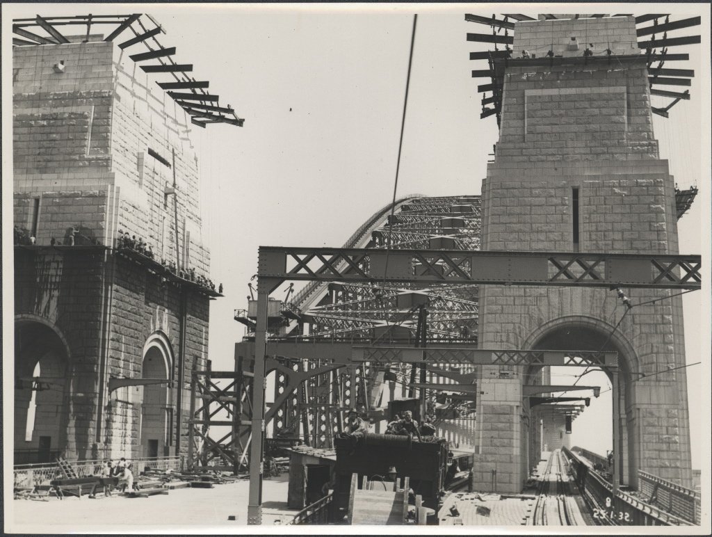 Workers attaching electric cables on the Harbour Bridge, 1932, Sydney Harbour