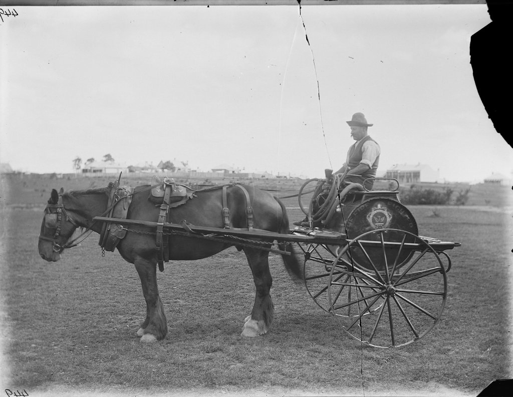 Clyde horsedrawn fire fighting cart with driver (1915)