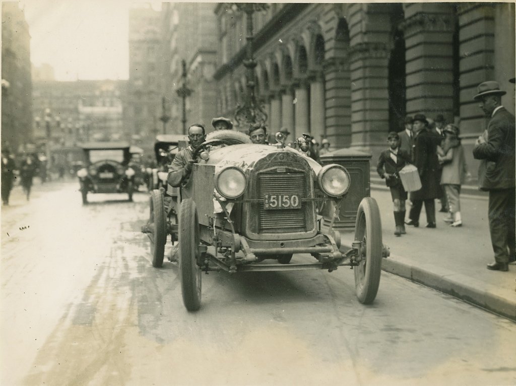 Dave Carrigan at wheel of a Willys Knight car, 1926, Martin Place