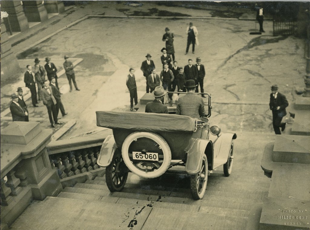 Overland car being driven down steps of Sydney Town Hall, 1920 - 1929, Sydney city centre