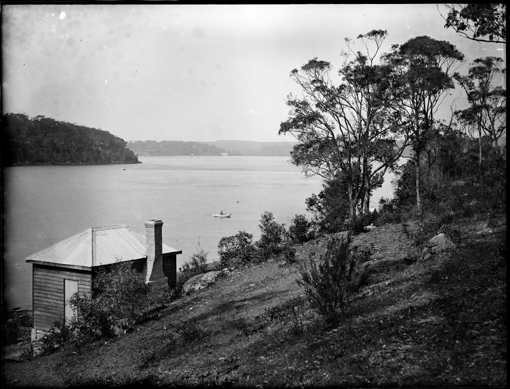 Sydney Harbour scene with brick hut in foreground (1900)