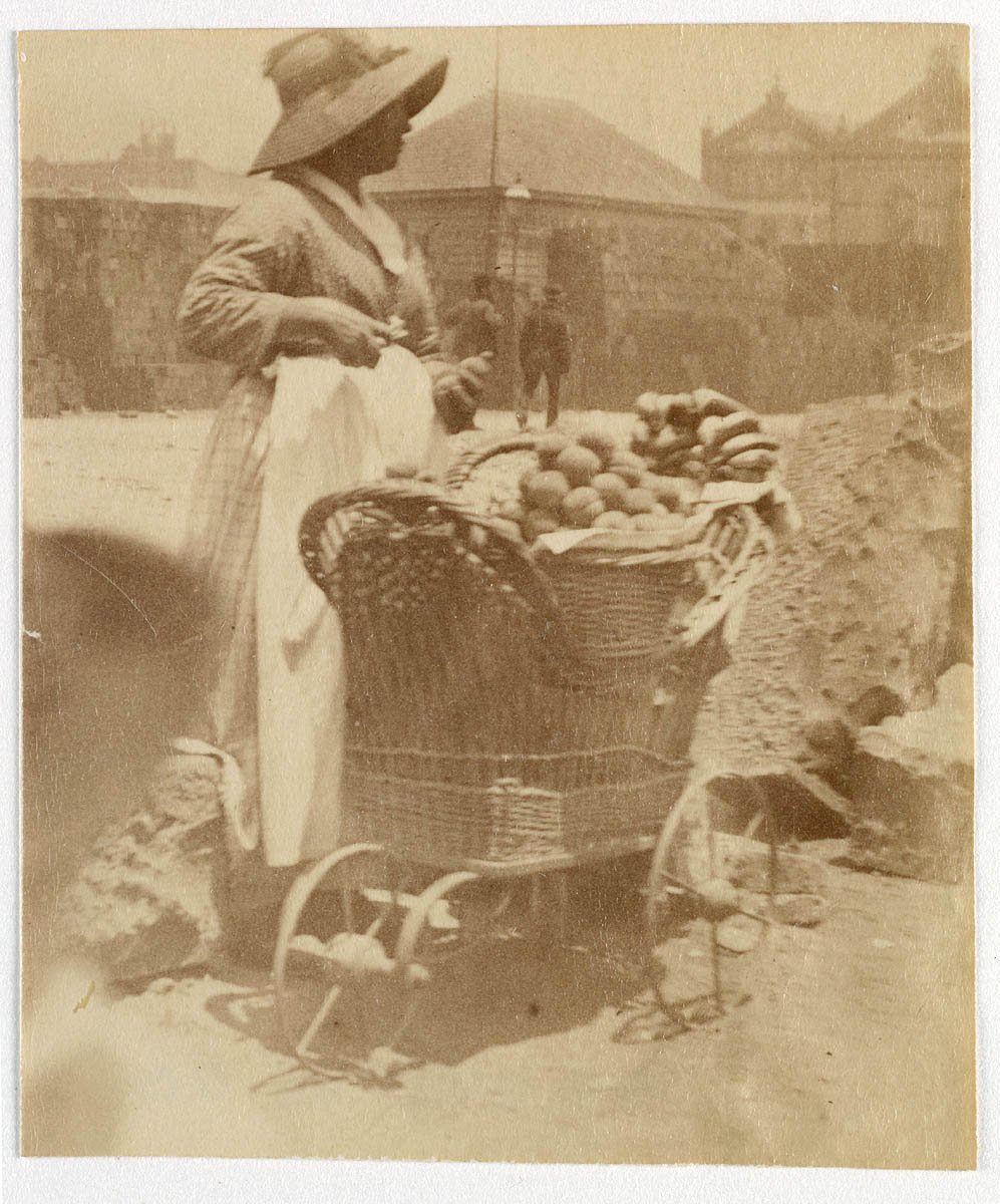Woman selling fruit from small barrow Sydney, ca. 1885-1890 - photographed by Arthur K. Syer (c. 1887)