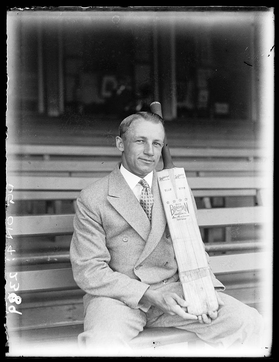 Don Bradman with his "Don Bradman" brand Sykes bat, ca. 1932 - by Sam Hood (c. 1932)