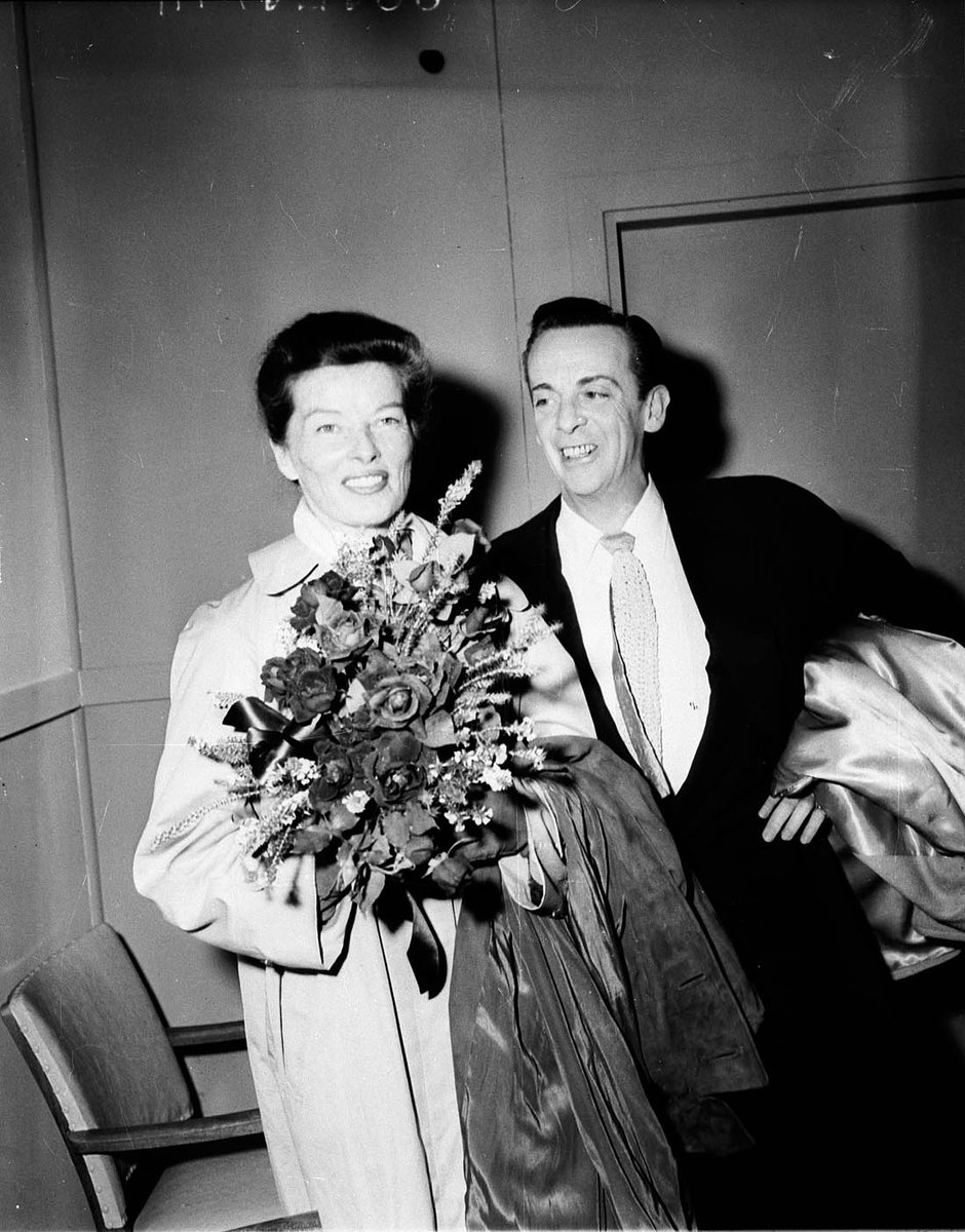 Katharine Hepburn and Robert Helpmann arrive at Kingsford Smith Airport, Sydney, 1955 - Australian Photographic Agency (APA) Collection, Mascot