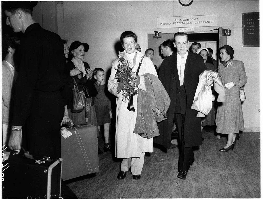 Katharine Hepburn and Robert Helpmann arrive at Kingsford Smith Airport, Sydney, 1955 - Australian Photographic Agency (APA) Collection, Mascot
