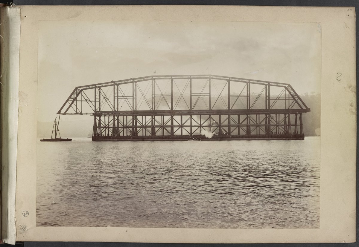 Span number 5 of Hawkesbury River Railway Bridge, New South Wales, Australia, atop timber framework on pontoon, moves towards piers) - C. Bayliss photo, Sydney LCCN2016651663 (1888)