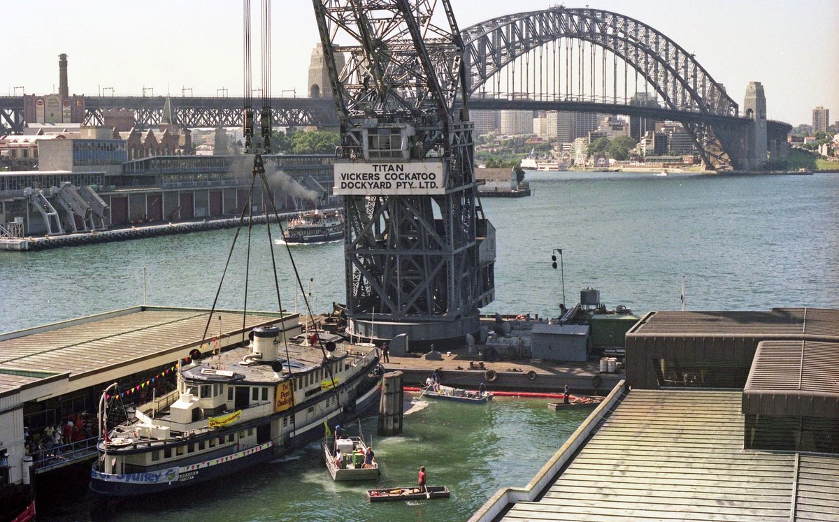 Sydney Ferry KARRABEE being refloated by Titan Crane at Circular Quay 1984