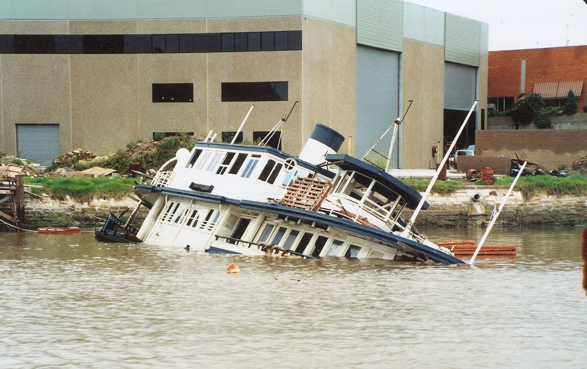 Sydney ferry LADY EDELINE sunk into the mud at Mortlake 1988