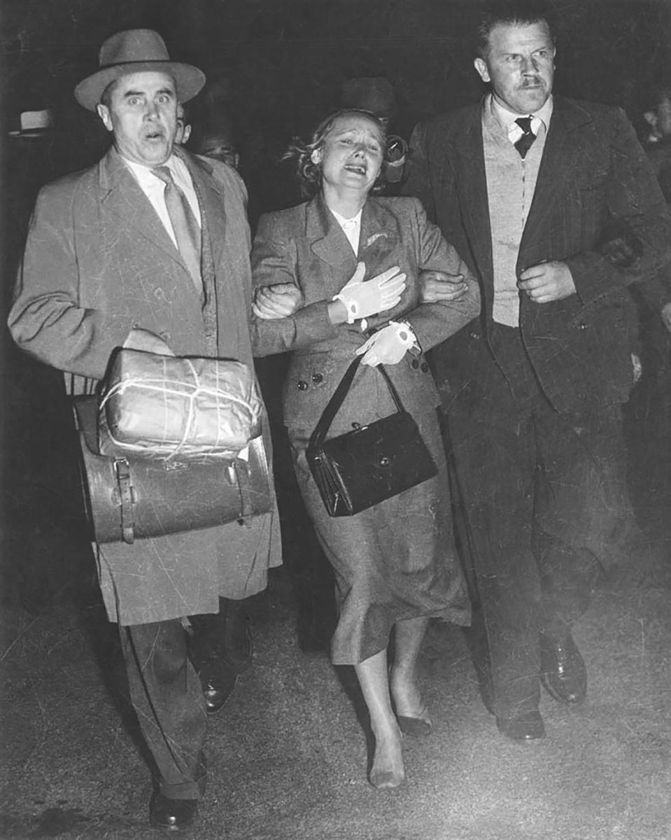 Evdokia Petrov escorted at Mascot Airport (1954)