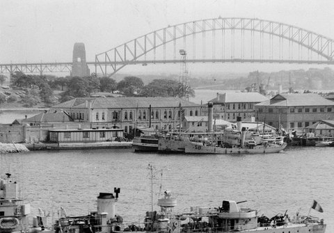 Former Sydney ferry KUTTABUL at Garden Island with two navy anti-submarine trawlers, including HMAS SAMUEL BENBOW, c. 1942