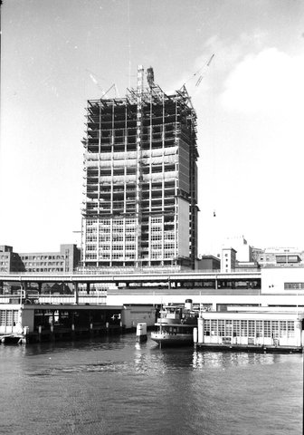 Sydney ferry KAMERUKA and AMP Building under construction, 1961