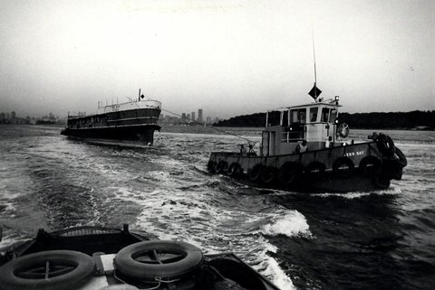Sydney ferry DEE WHY being towed for scuttling, 1976