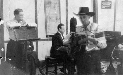 Tex Morton, country & western singer, recording in A.B.C Studio - Sydney, NSW, 1938