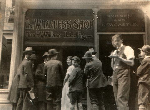 Crowd outside McKenzie's wireless shop, c. 1928