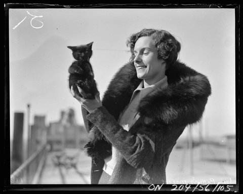 Jean Batten with cat mascot Buddy, 1934