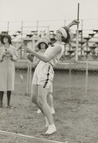 Nell Gould of St George throwing the discus, 1937