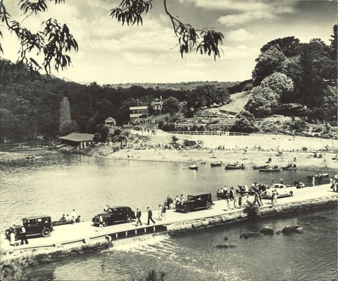 Cars crossing the causeway at Audley, 1930s