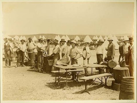 Dinnertime at the Bushmens Contingent Camp, c. 1900