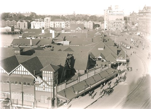 View of ferry wharves and surrounding area at Circular Quay, c. 1955