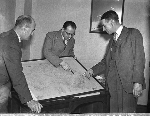 2UW staff and map of Australia, 1937