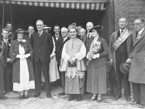 A Catholic bishop addressing a small group, c. 1935