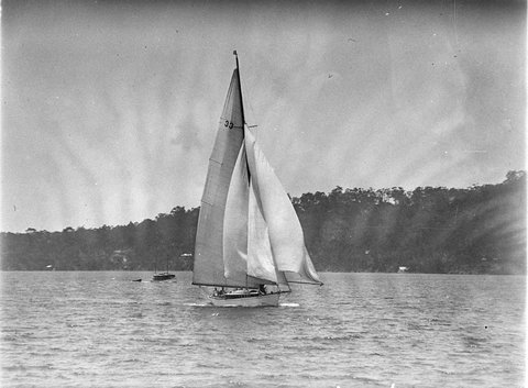 A maxi with spinnaker set, 1930s