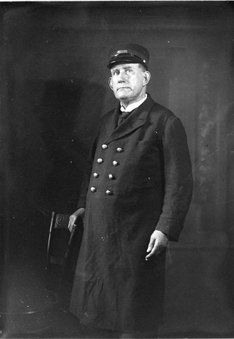 A railway guard in uniform, 1930s