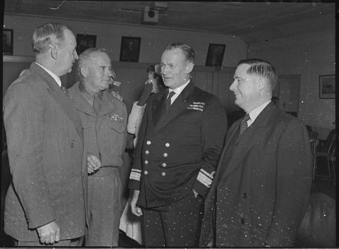 Arrival of Rear Admiral HJ Buchanan second from right Brigadier JW Main and Mr G Duncan president of Newcastle branch of the Royal Empire Society, 1955