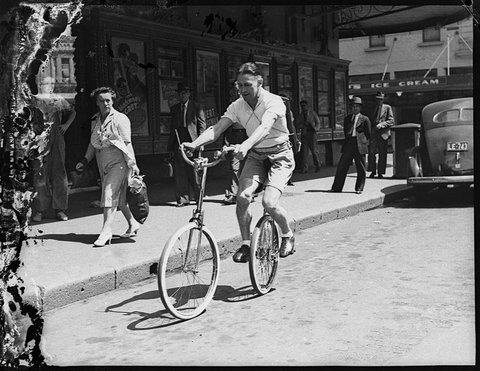 Bike rider Capitol Theatre, 1947