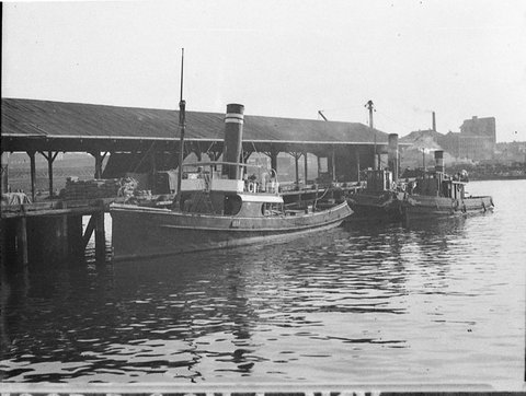 Boats at wharf, 1930s