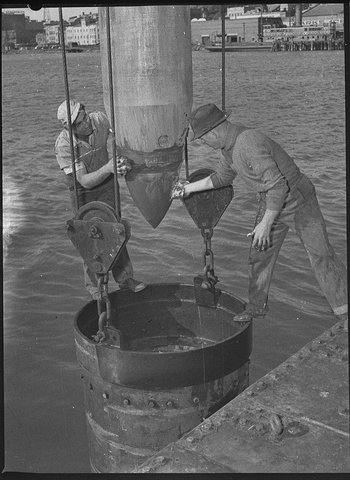 Check on Lobmitz Rockbreakers operating in the inside cut of Wickham Channel deepening it to 28 feet at low water, 1954