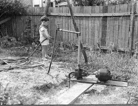 Child and bore water at Kingsford Mr Dixons Mr Callans, 1940
