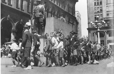 Children march past, 1930s