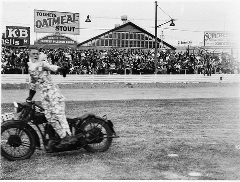 Clowns on motorbike in the ring, 1930s