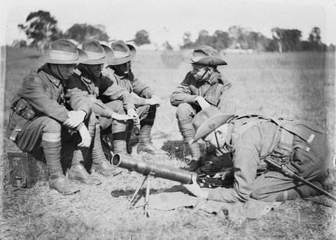 Corporal of First Field Cadre instructs cadets in the Lewis gun, 1930s