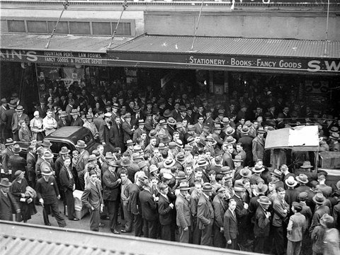 Crowd listening to the Melbourne Cup broadcast outside Swains Bookstore in Pitt Street Sydney, 1934