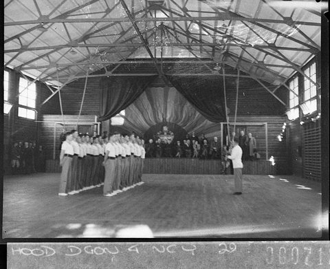 Crowd watches army cadets in a physical culture course, 1938