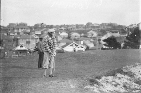 D Coonan chipping over a bunker onto green, 1925–57