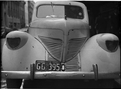 Damaged motor car, c. 1946