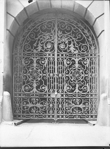 Decorative iron gates made by Cyclone Gate and Fence Co for building at Kings Cross taken for Building Publishing Co, 1938