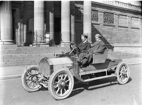 Driver AP Wright of Angus Son and passenger probably John Leys in a strippeddown Armstrong Whitworth recordbreaking chassis in front of the Art Gallery, 1913