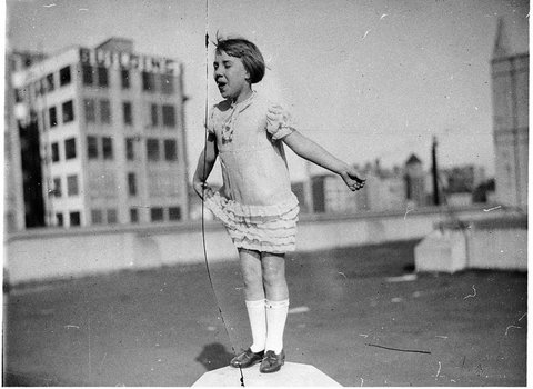 Eisteddfod competitor on rooftop, 1930s