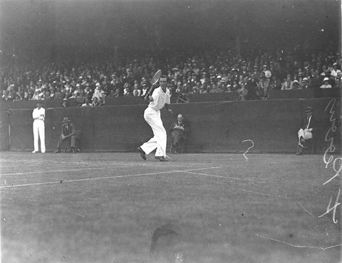 English ace Fred Perry in action centre court White City, c. 1930