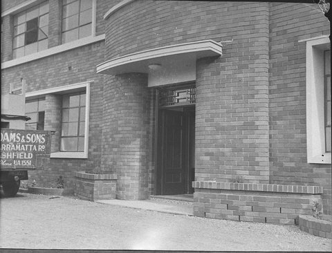 Entrance porch to an AWA building taken for Building Publishing Co, 1944