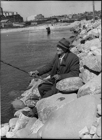 Fishing from the breakwater, 1956