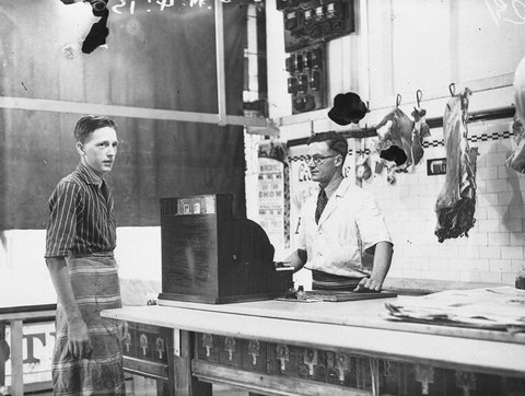 Fred Saville butcher of Earlwood and his assistant after a robbery where the thief demanded 2 pounds from the till, 1935